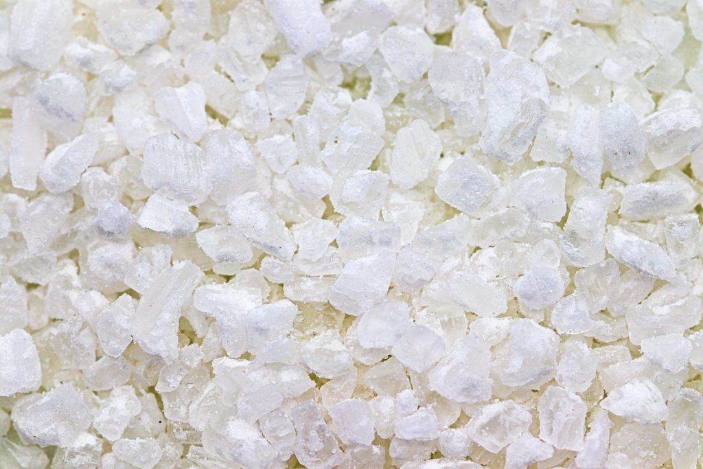 Close up of white powder granules for medicine.